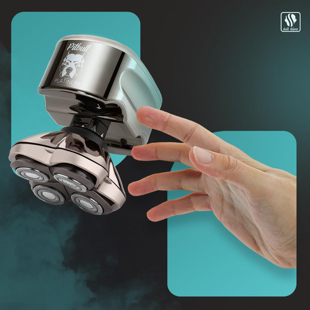 Skull Shaver Pitbull Platinum PRO in hand during wet shave in shower for convenience