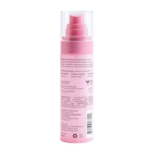 Skylar Boardwalk Delight mist-spray captured mid-application for easy on-the-go refresh.
