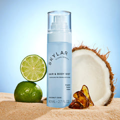 Skylar Coconut Cove mist in hand demonstrates portable size for daily refresh.