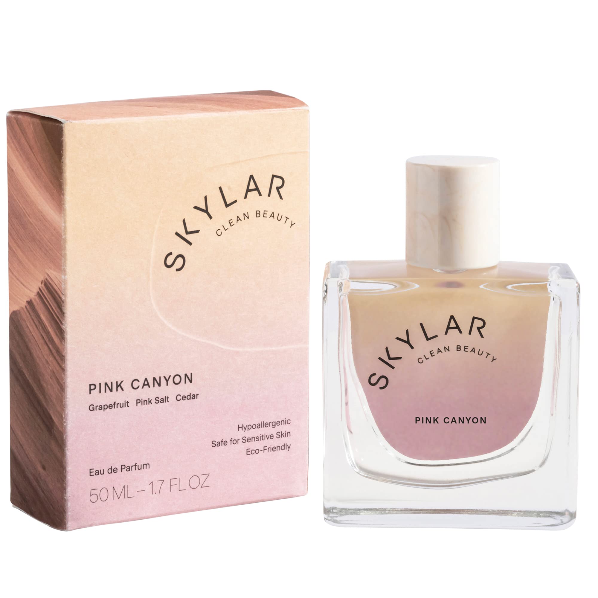 Skylar Pink Canyon bottle front highlights a light woody citrus scent for daily wear.