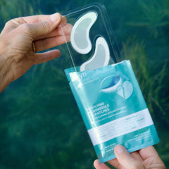 Skyn ICELAND under-eye patches applied beneath the eye area for hydration