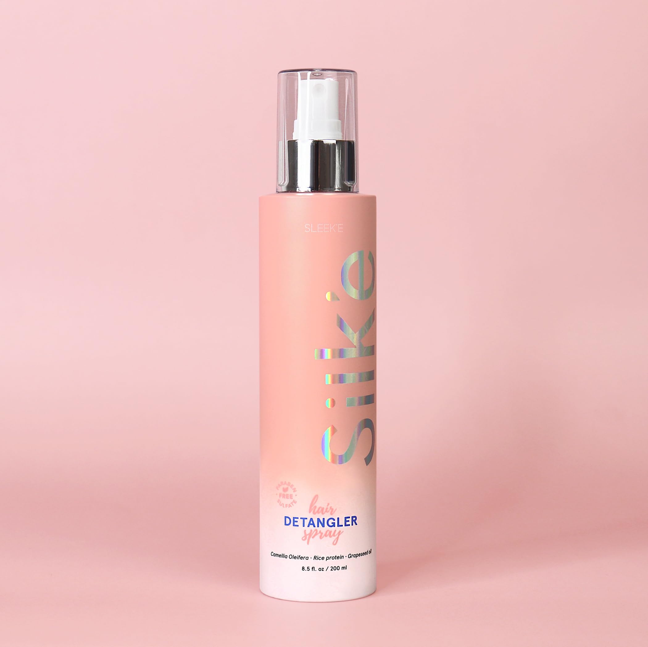 Sleek'e Hair Silk'e Detangler Spray bottle for easy brushing and frizz control.