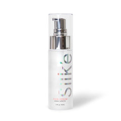 Sleek'e Silk'e Serum frizz-control on hair demonstrates glide during smoothing routine.