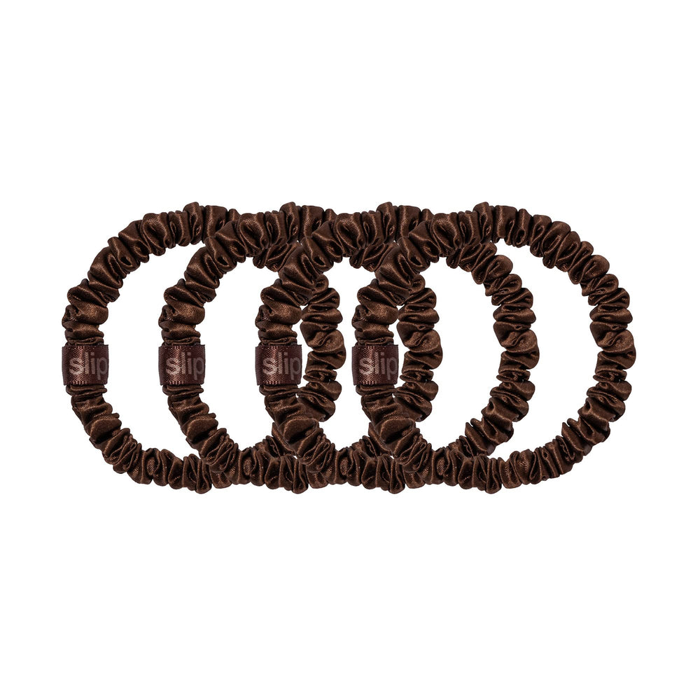 SLIP luxury hair accessory; dark brown silk skinny scrunchies elevate everyday styling.
