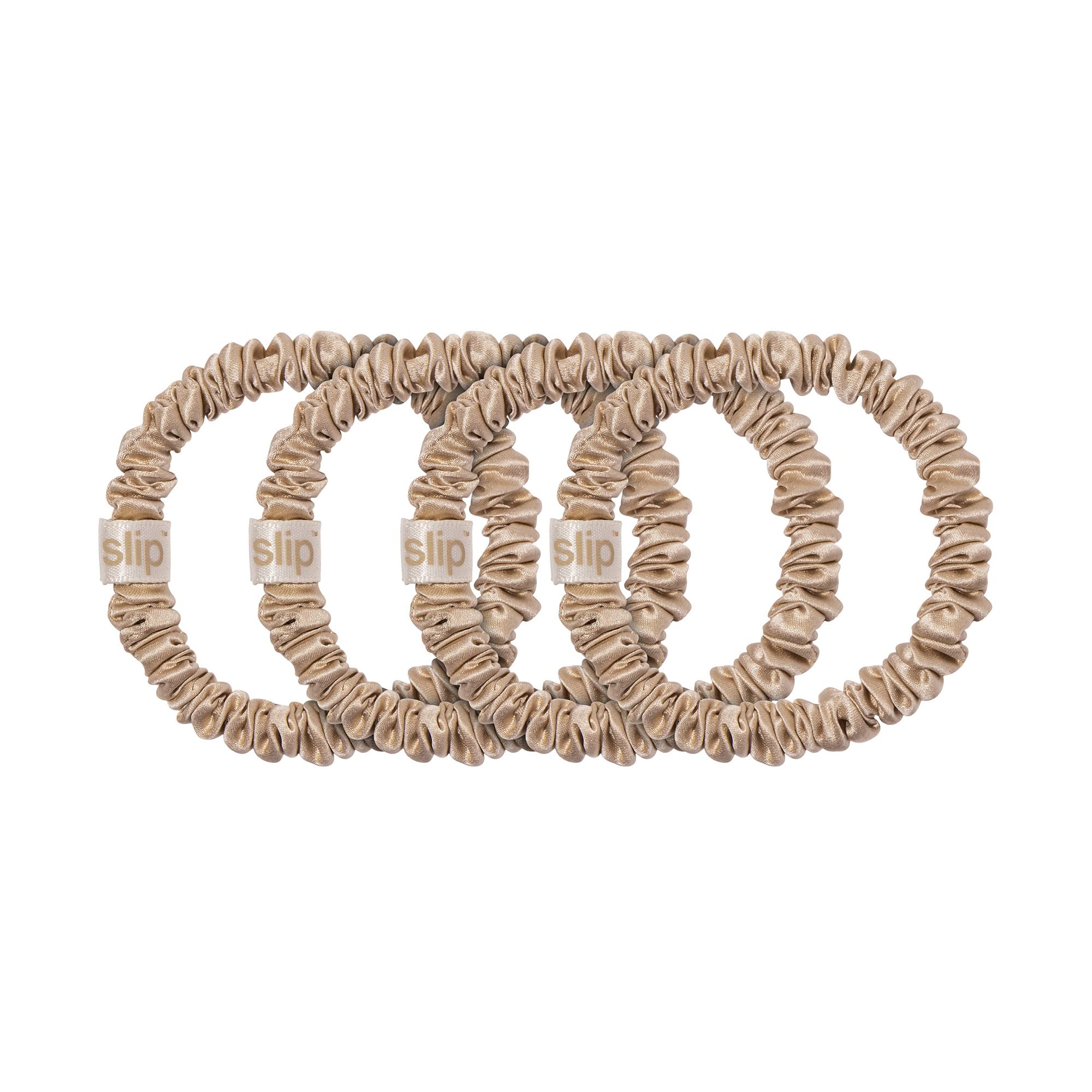 Slip Silk Skinny Scrunchies blonde hands-holding image emphasizes soft texture and luxurious feel.