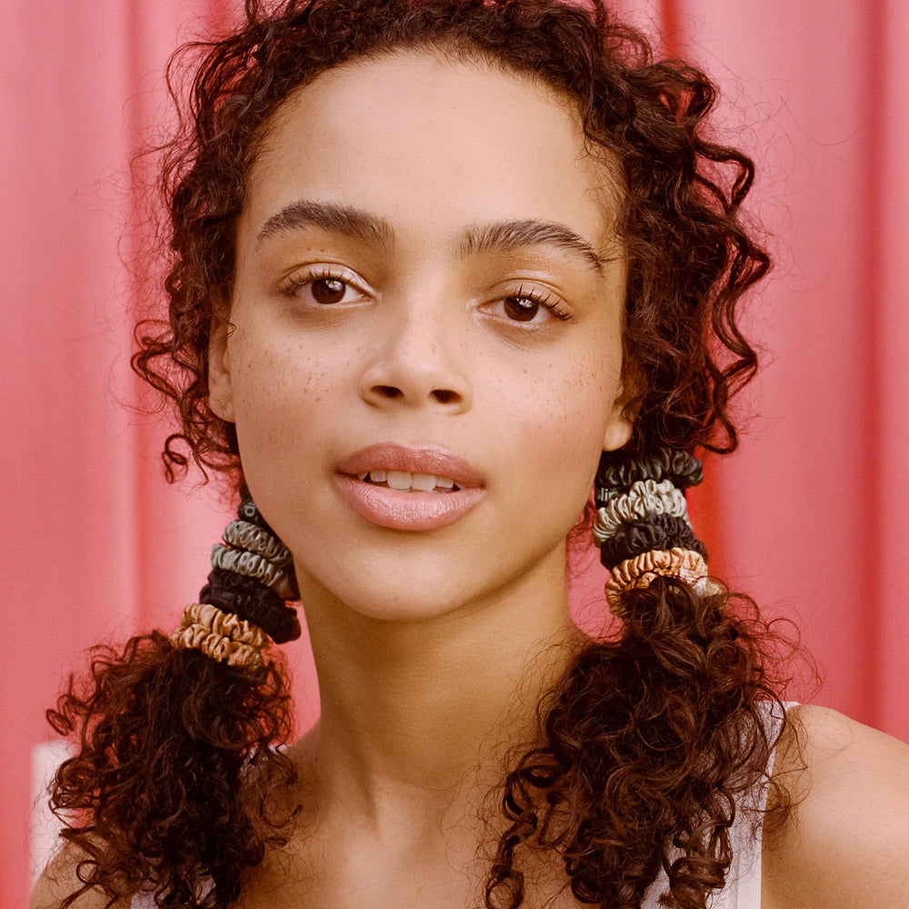 SLIP Skinny Scrunchies Evergreen closeup showcases silky texture for smooth, snag-free styling.