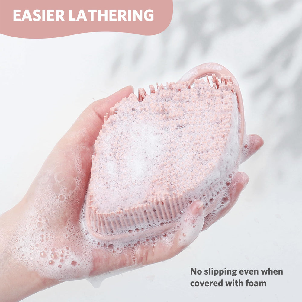 Sndyi silicone body scrubber with ergonomic grip stays steady in foam during showers.