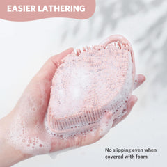 Sndyi silicone body scrubber with ergonomic grip stays steady in foam during showers.