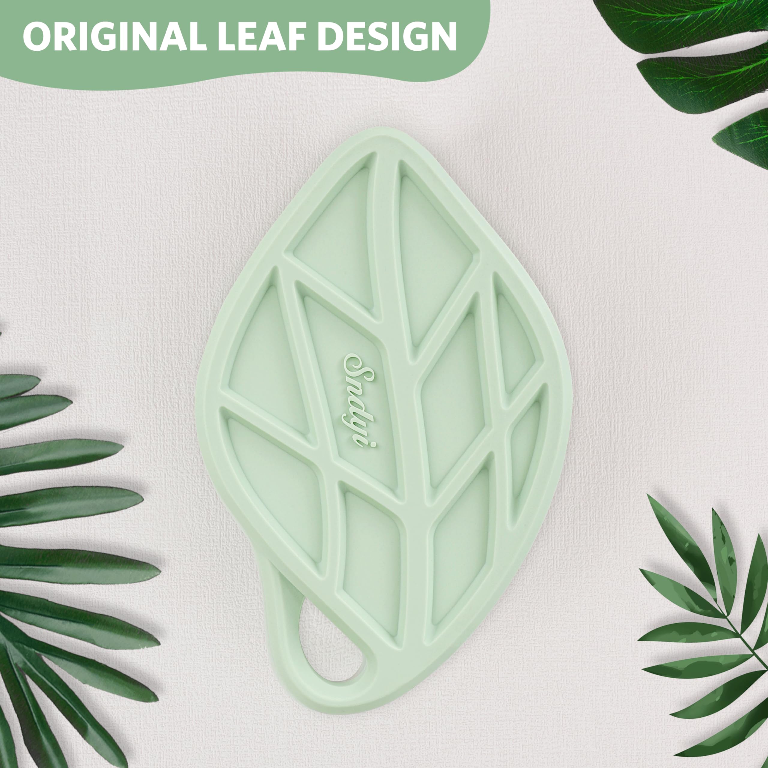 Sndyi silicone body scrubber hanging hole for easy drying and storage.