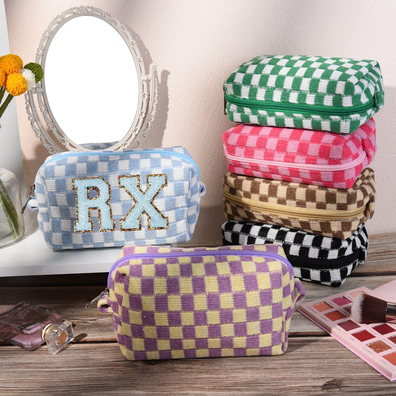 SOIDRAM travel toiletry bag collection in pink and black for on-the-go essentials.