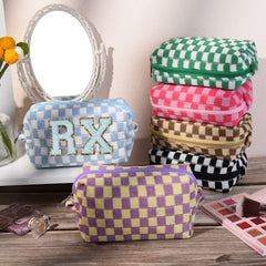 SOIDRAM travel toiletry bag collection in pink and black for on-the-go essentials.