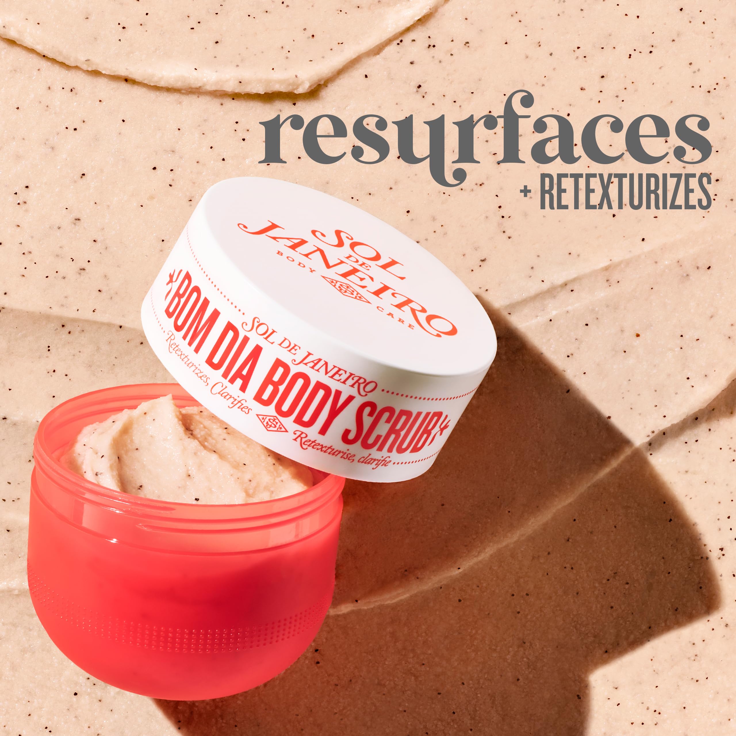 Close-up of Bom Dia Bright scrub texture showing passionfruit seeds for gentle exfoliation.