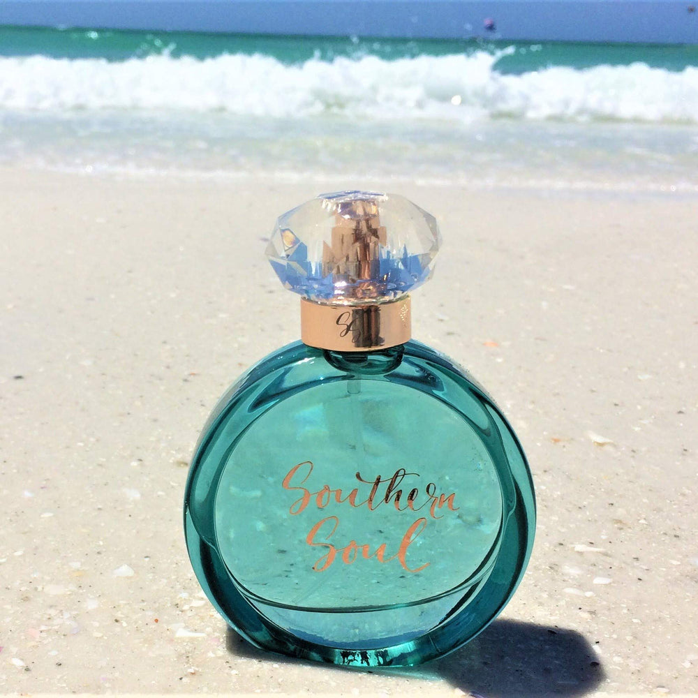 Perfume swatch on skin reveals a soft scent that lasts through the day.