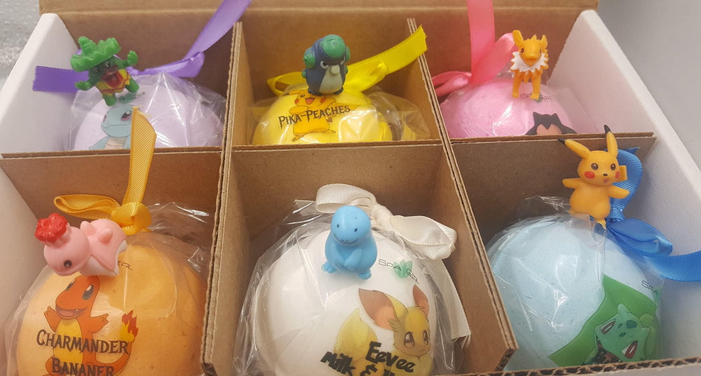 Spa Pure bath bomb packaging highlights 6 count and toy inside.