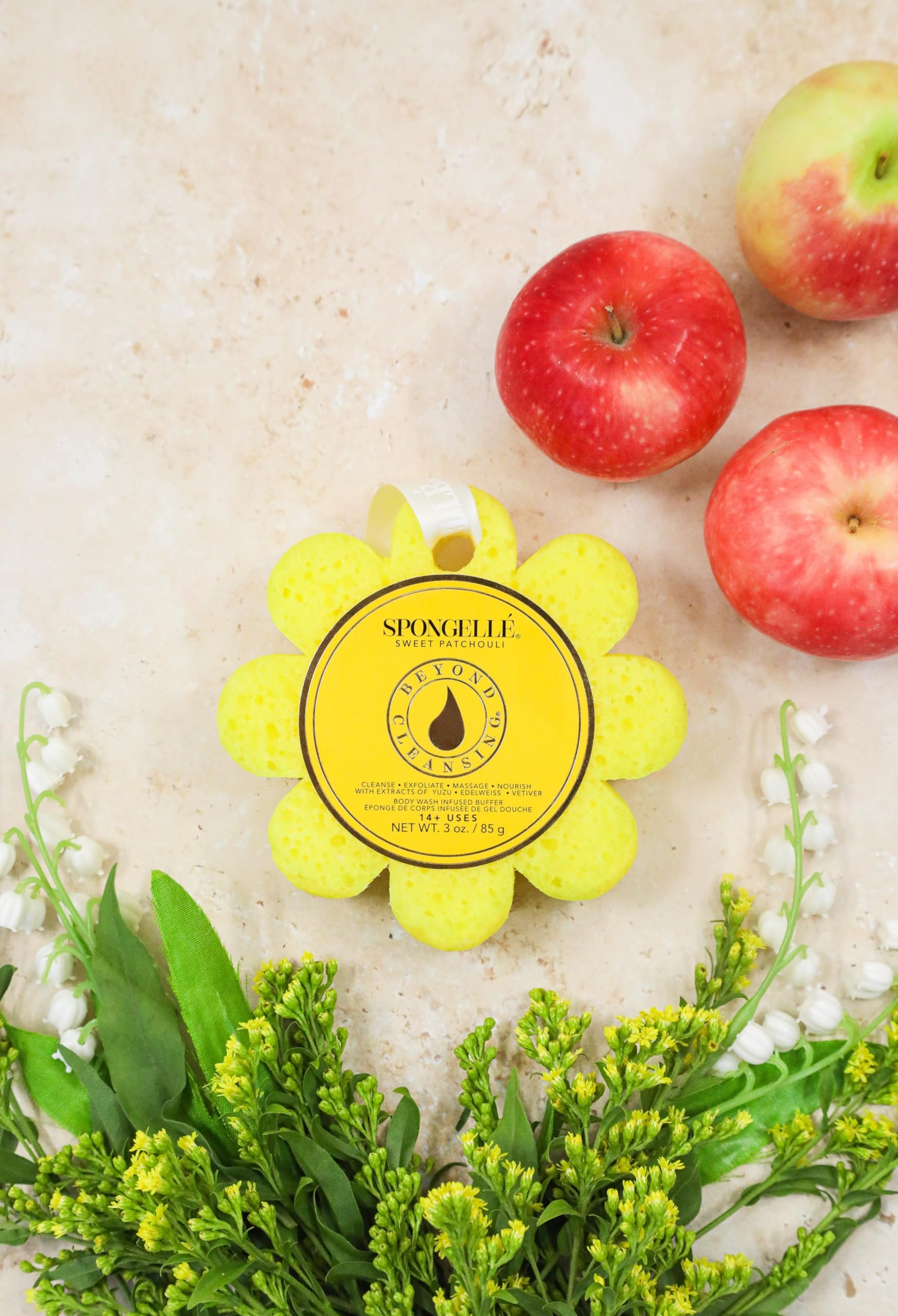 SPONGELLÉ Sweet Patchouli Wild Flower portable design with hanging ribbon for travel.