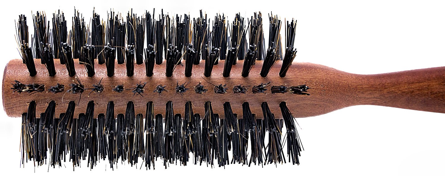 Spornette Italian round brush volumizes and shapes hair during styling for volume.