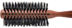 Spornette Italian round brush volumizes and shapes hair during styling for volume.