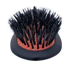 Spornette nylon bristles penetrate to detangle with ease
