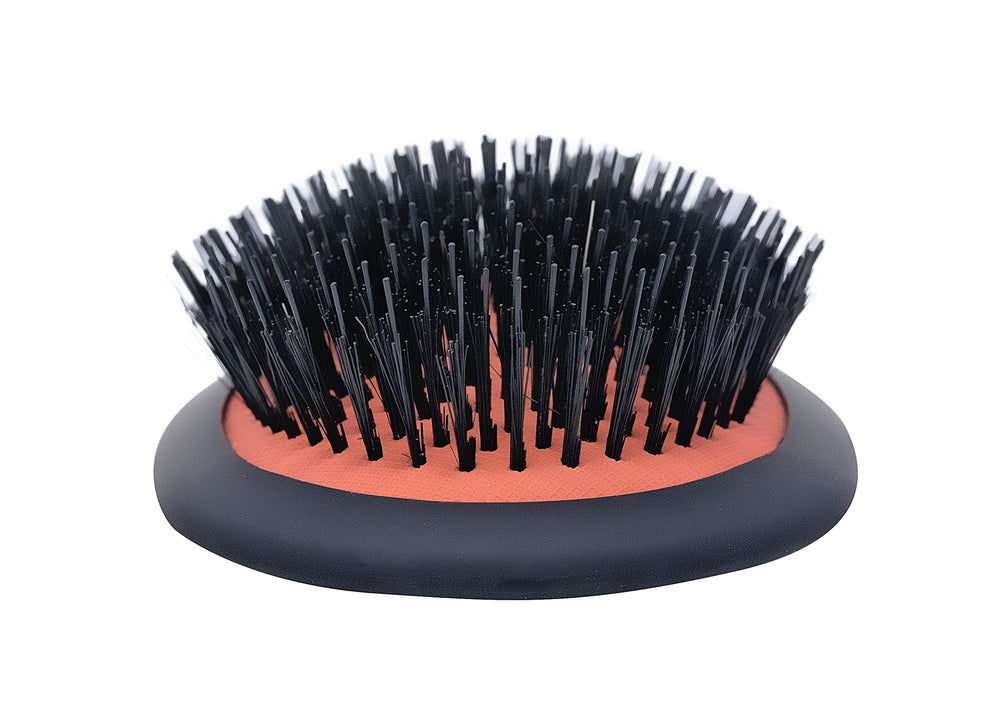 Spornette satin-handle brush shown for comfortable styling