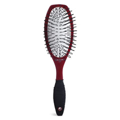 Spornette Super Looper wig brush close-up shows ergonomic handle for gentle detangling