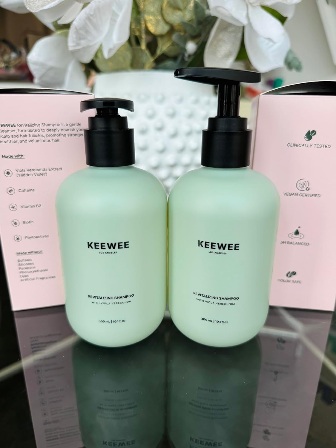 SRILabs KEEWEE shampoo applied to scalp for nourishment.