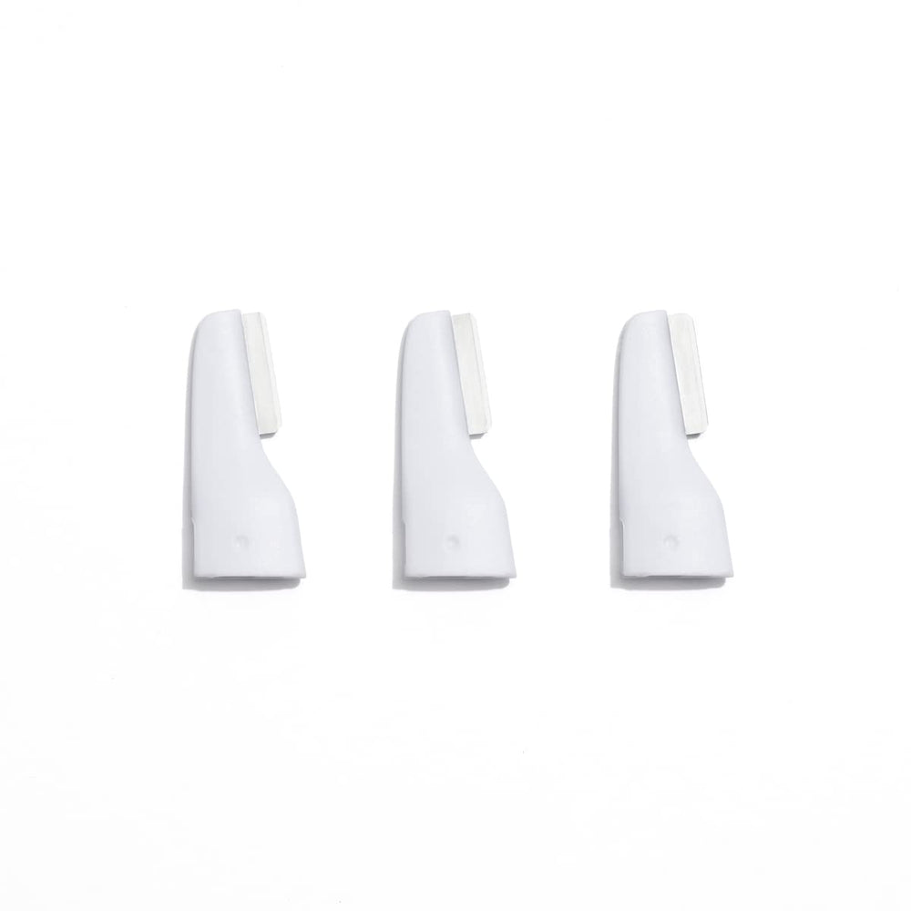 StackedSkincare replacement dermaplaning blades 3-pack for quick at-home exfoliation and peach fuzz removal.