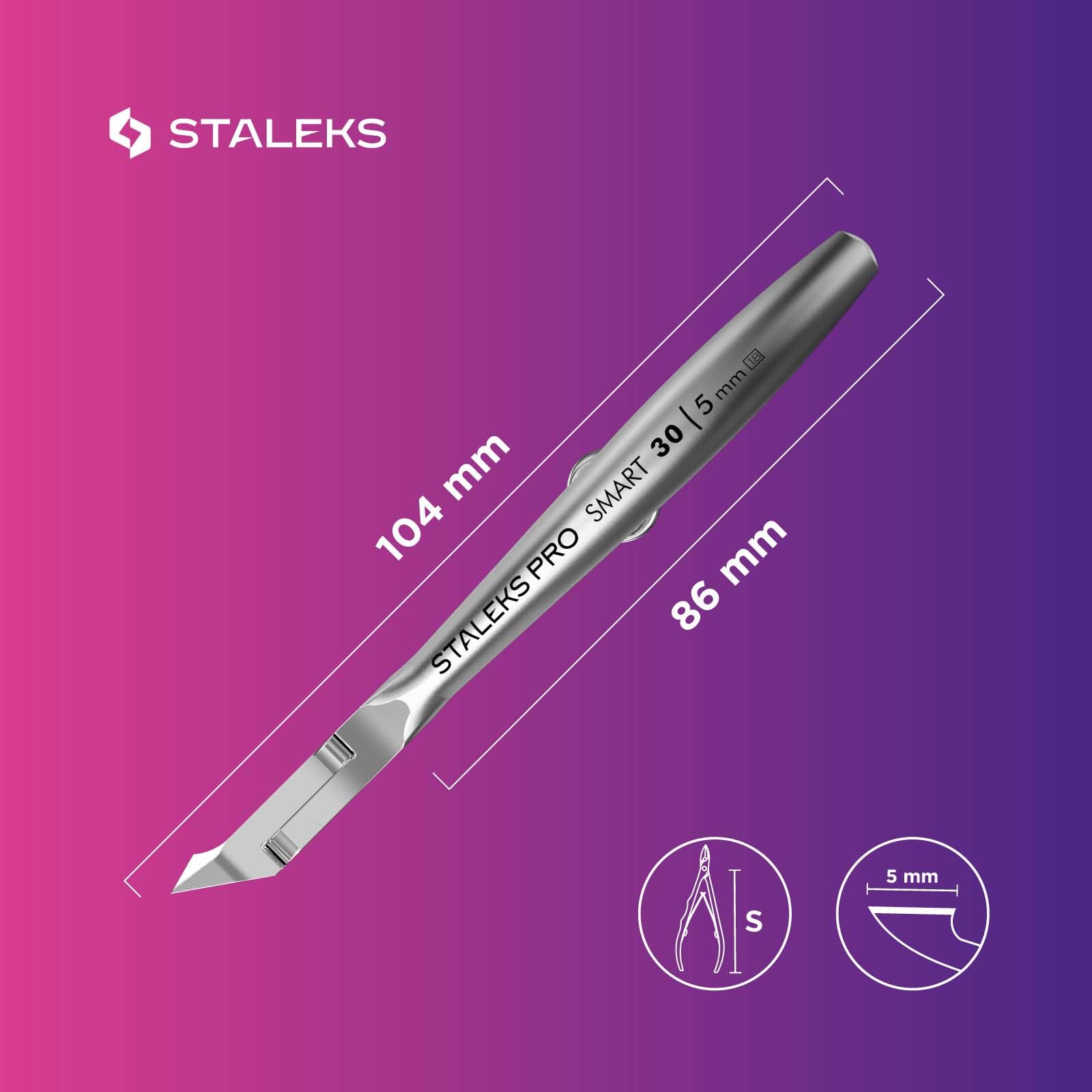 Staleks Pro Cuticle Trimmer in a professional manicure setup for precise nail care