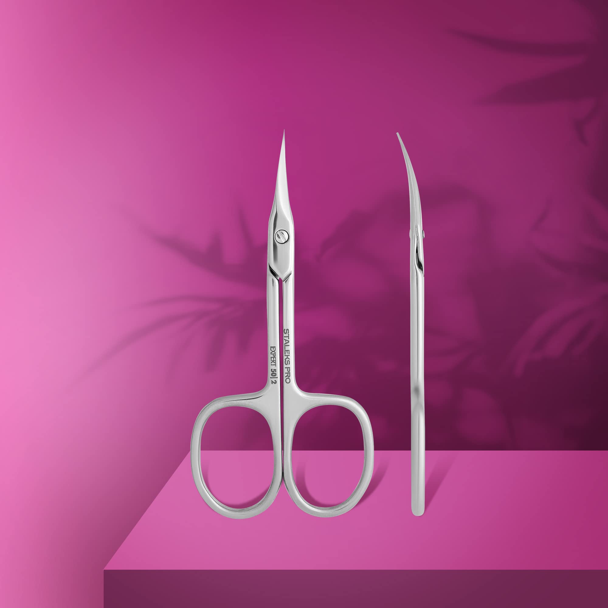 Staleks Pro Expert 50-cuticle scissors showing ergonomic handles for comfortable grip.