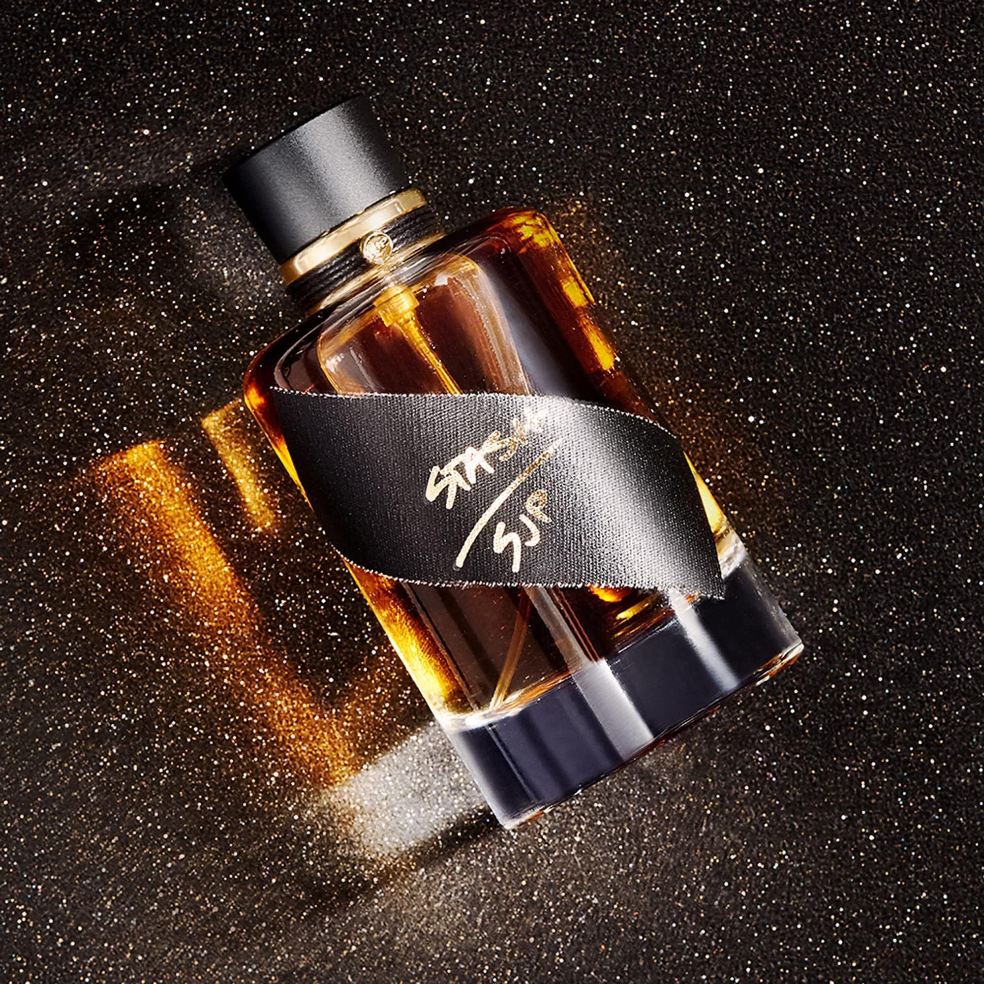 Close-up of rolled cap on Stash bottle indicating premium finishing.