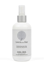 Static Blok bottle front view demonstrates long-lasting anti-static protection for hair.
