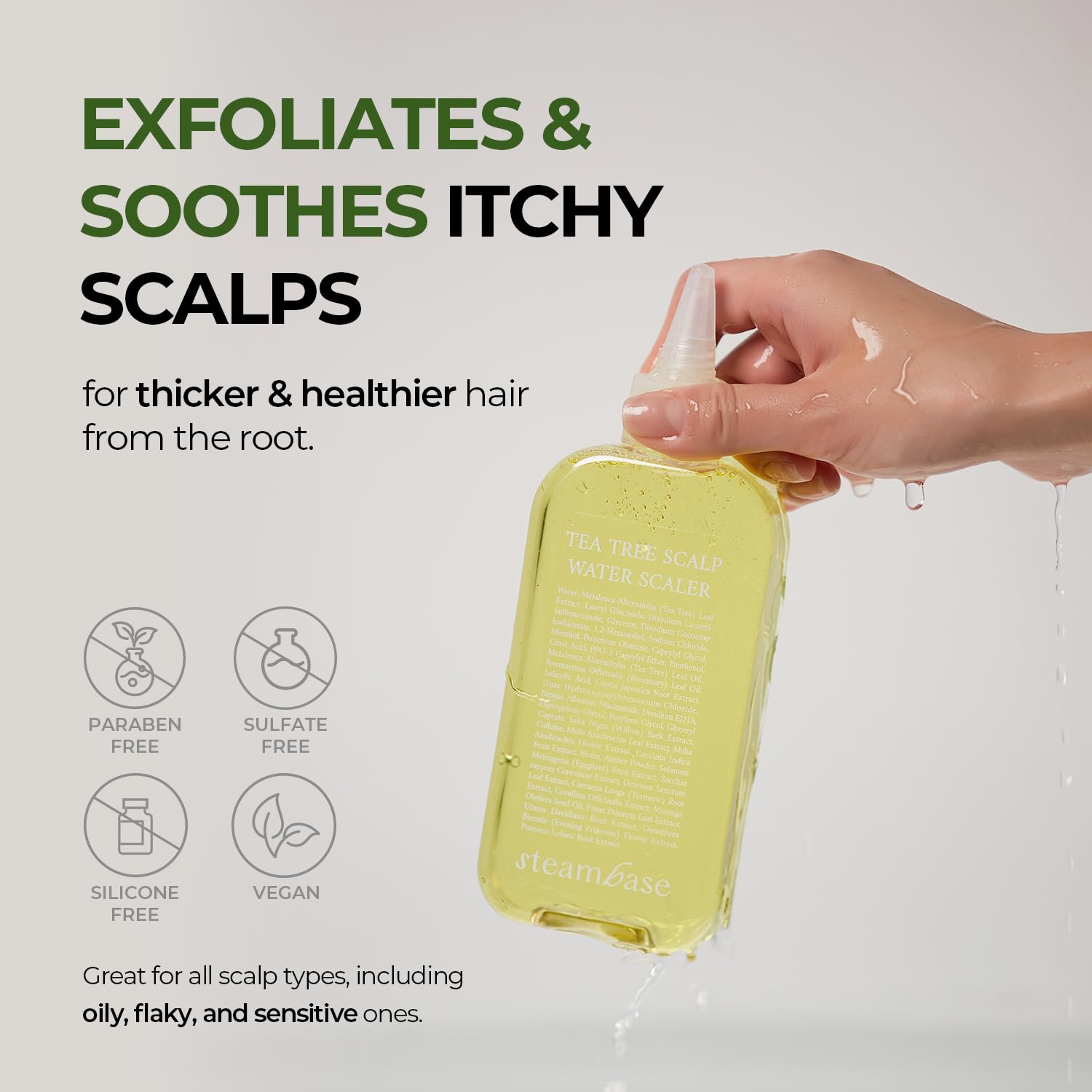 Steambase Tea Tree Scalp Treatment cone nozzle delivering targeted scalp cleansing.