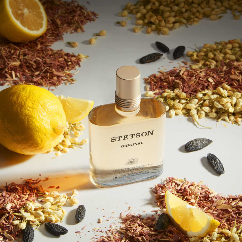Stetson Original Aftershave wood texture closeup evokes rugged frontier style for everyday confidence.