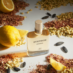 Stetson Original Aftershave wood texture closeup evokes rugged frontier style for everyday confidence.