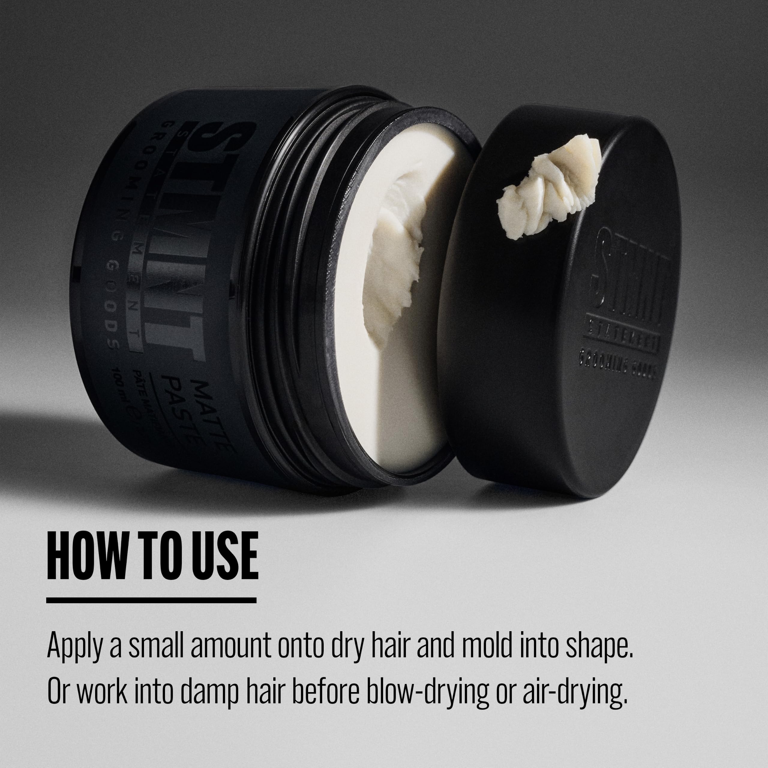 STMNT paste beside hand for size comparison showing compact travel-friendly benefit