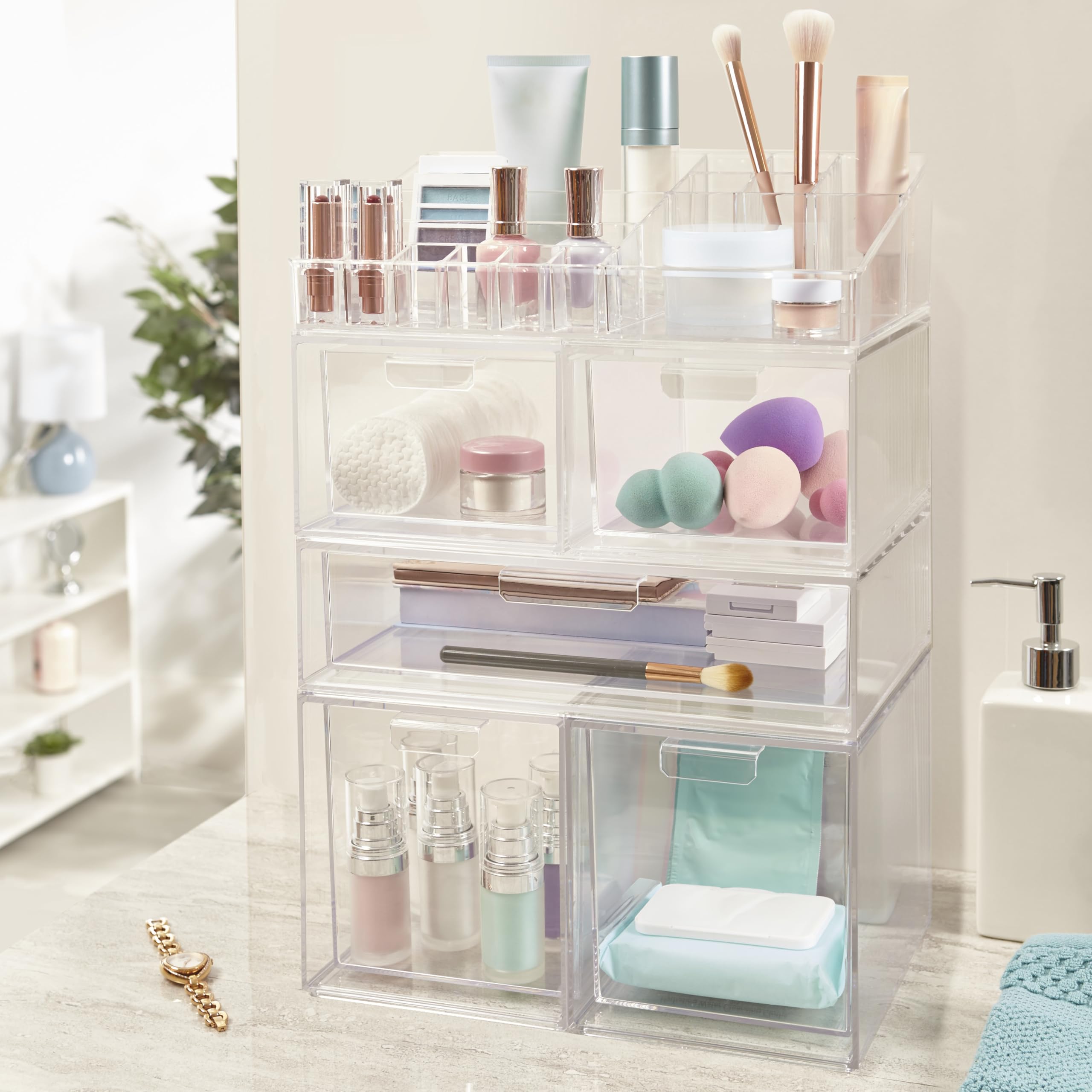 STORi Audrey clear vanity organizer with eyeshadow palettes neatly arranged for quick access.