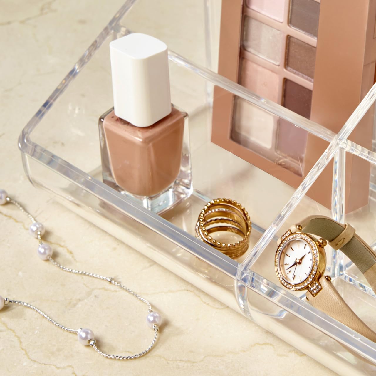 STORi clear acrylic organizer boosts visibility for cosmetics and accessories.