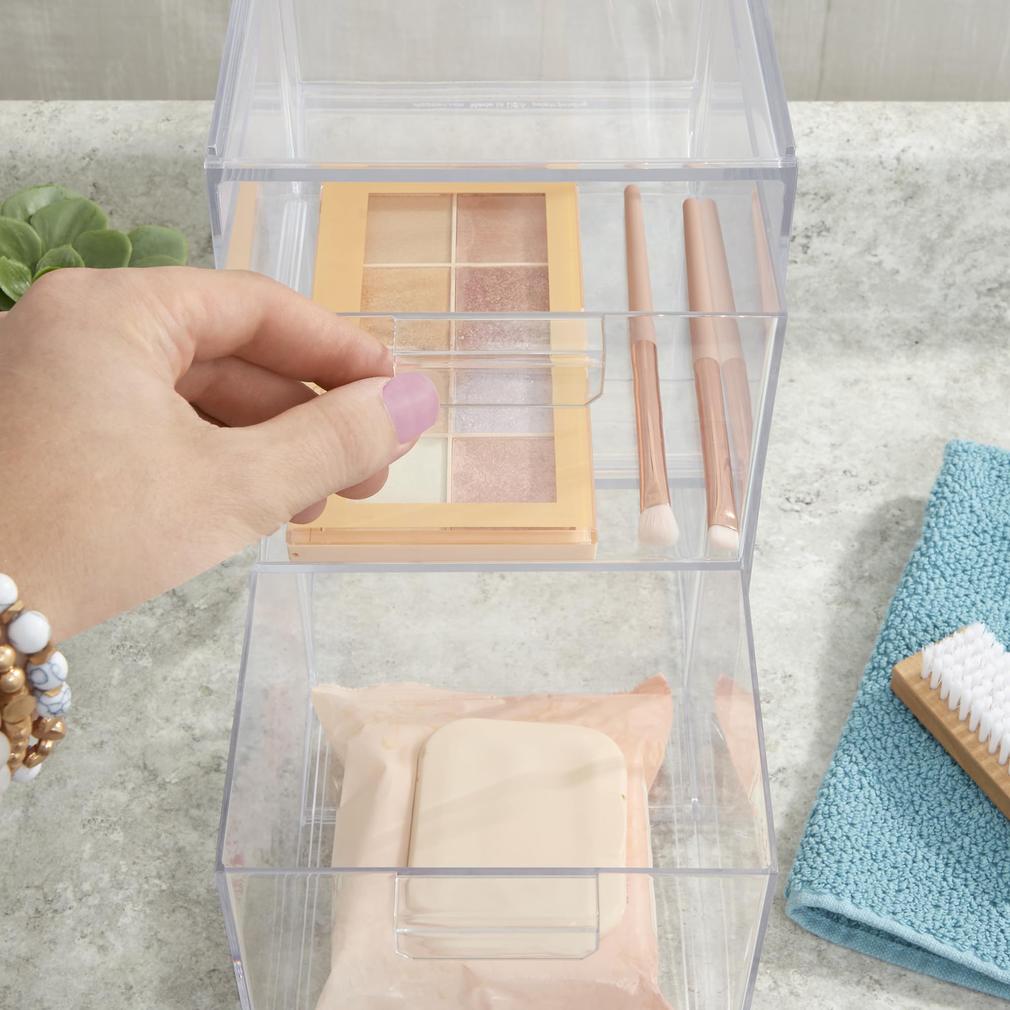 STORi Audrey clear bin under-sink organizer fits tight spaces while maintaining quick item visibility.