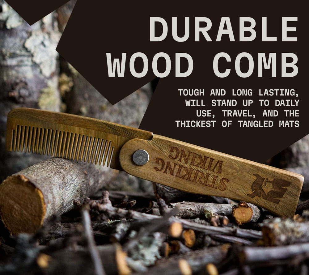 Striking Viking folding sandalwood comb in pocket, portable grooming tool.