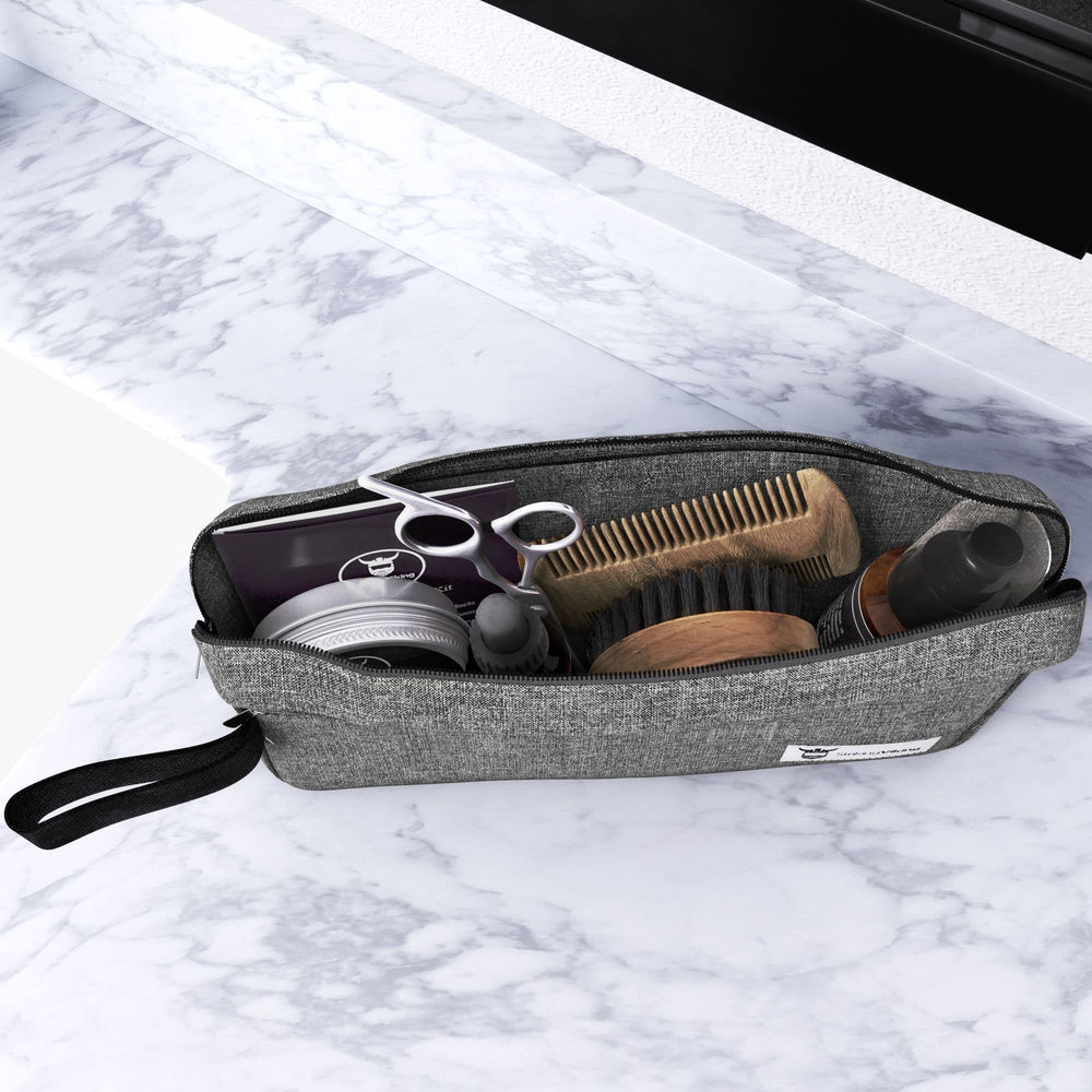 Striking Viking foldable sandalwood comb demonstrates easy detangling and even product spread.