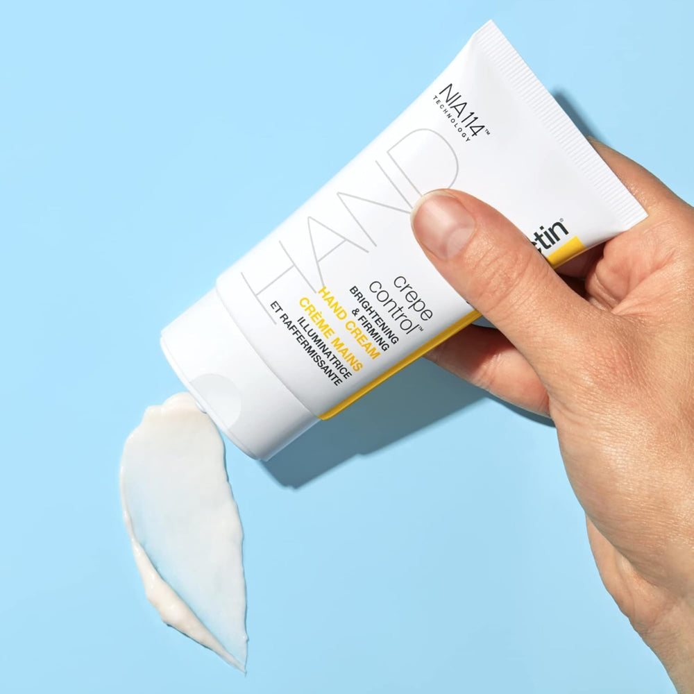 StriVectin cream being smoothed onto hands, demonstrates visible smoothing benefit