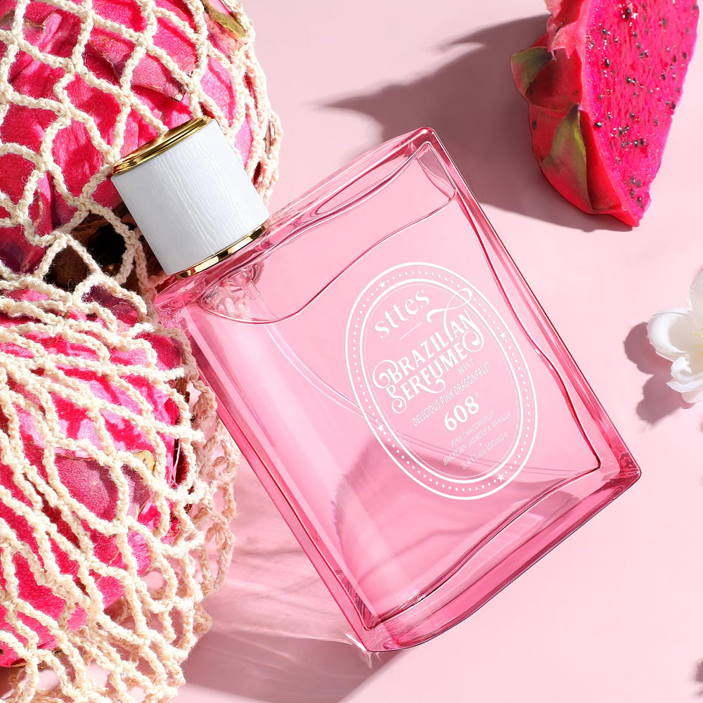 Sttes Perfume 608 display uses vibrant pink hues to signal tropical-inspired scent.