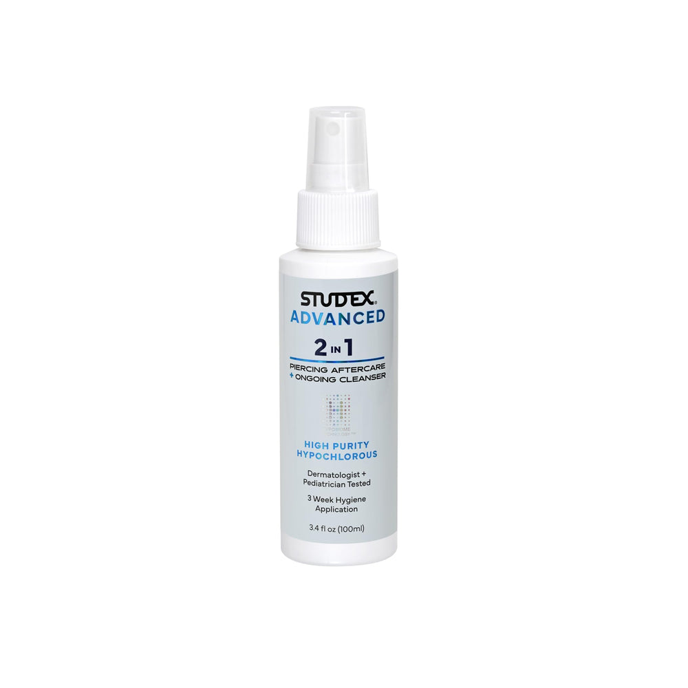 Studex Advanced 2-in-1 aftercare bottle shows compact skin-friendly piercing care.