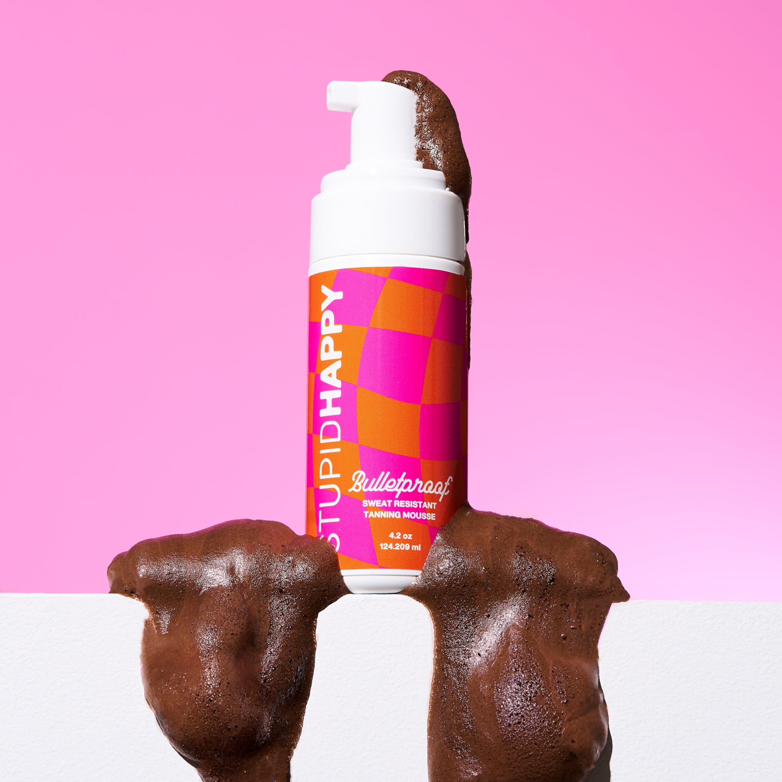 Stupid Happy self tanner mousse water-resistant layer after splash