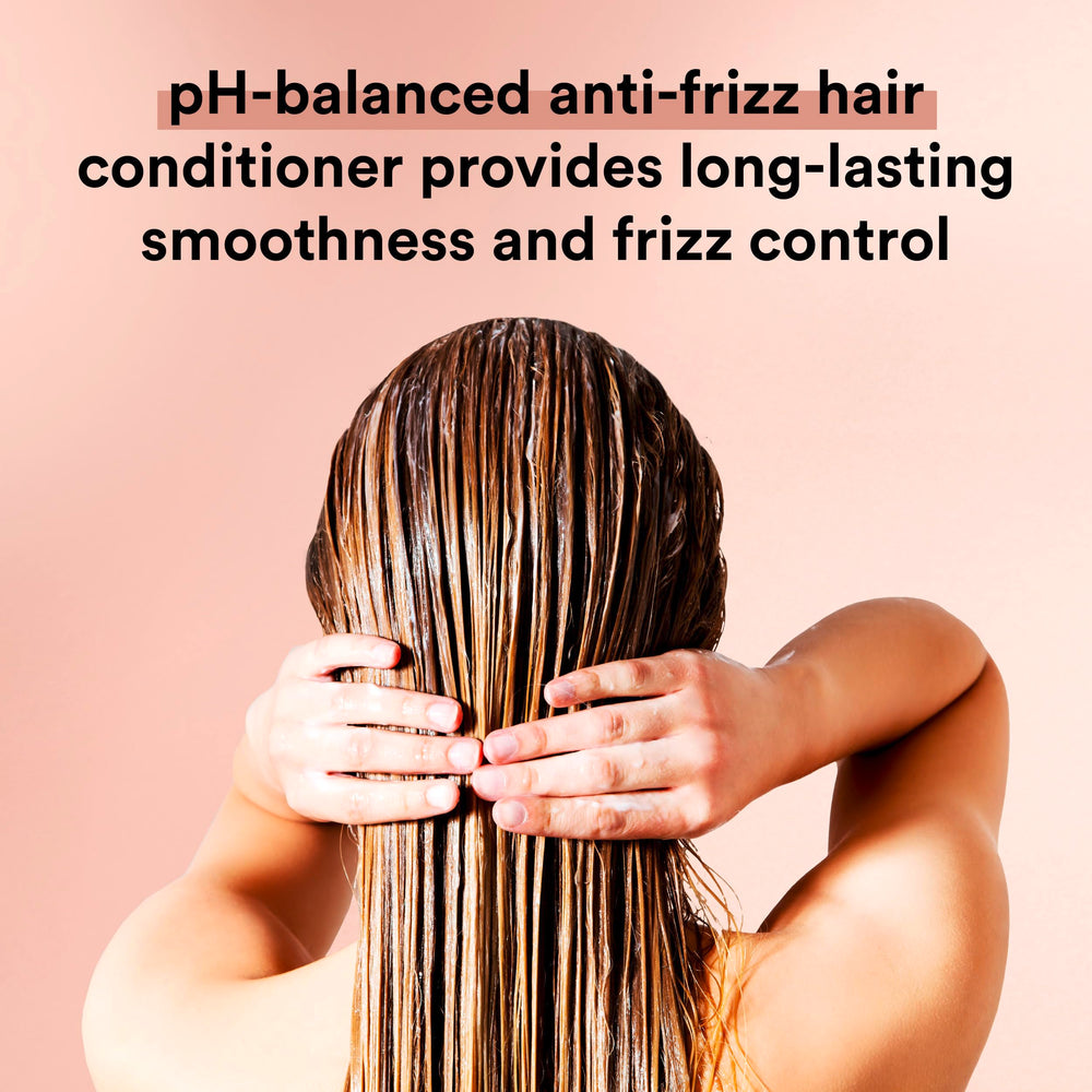 Suave Anti-Frizz care shot captures glossy, controlled hair with reduced frizz.