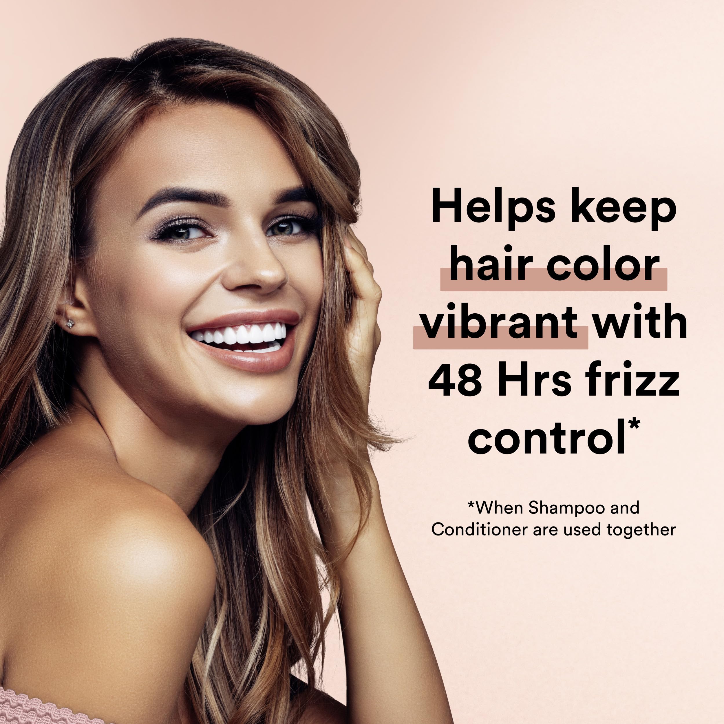 Close-up shows smooth, shiny hair after using Suave Keratin