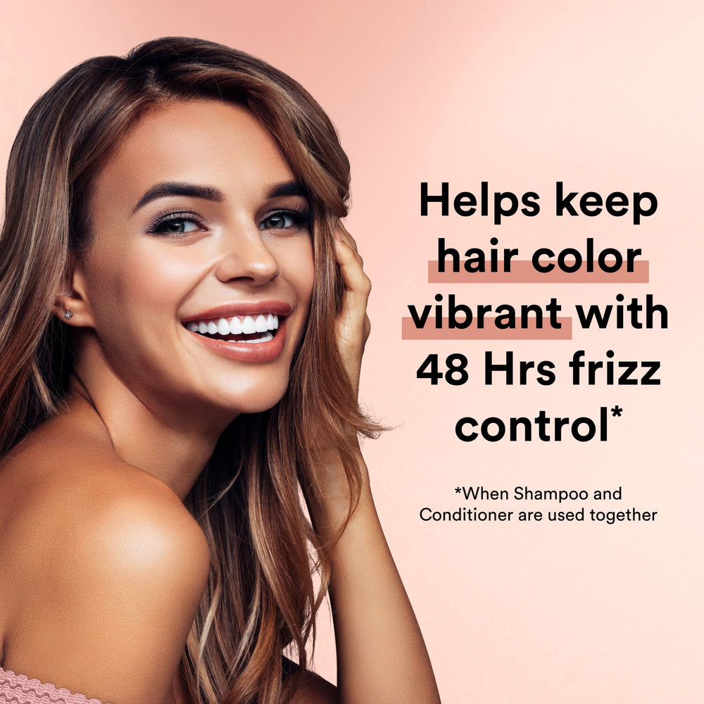 Close-up shows smooth, shiny hair after using Suave Keratin