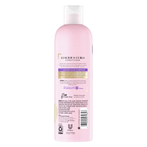 Suave Luscious Curls Conditioner closeup texture highlights moisture and smoothness for defined curls