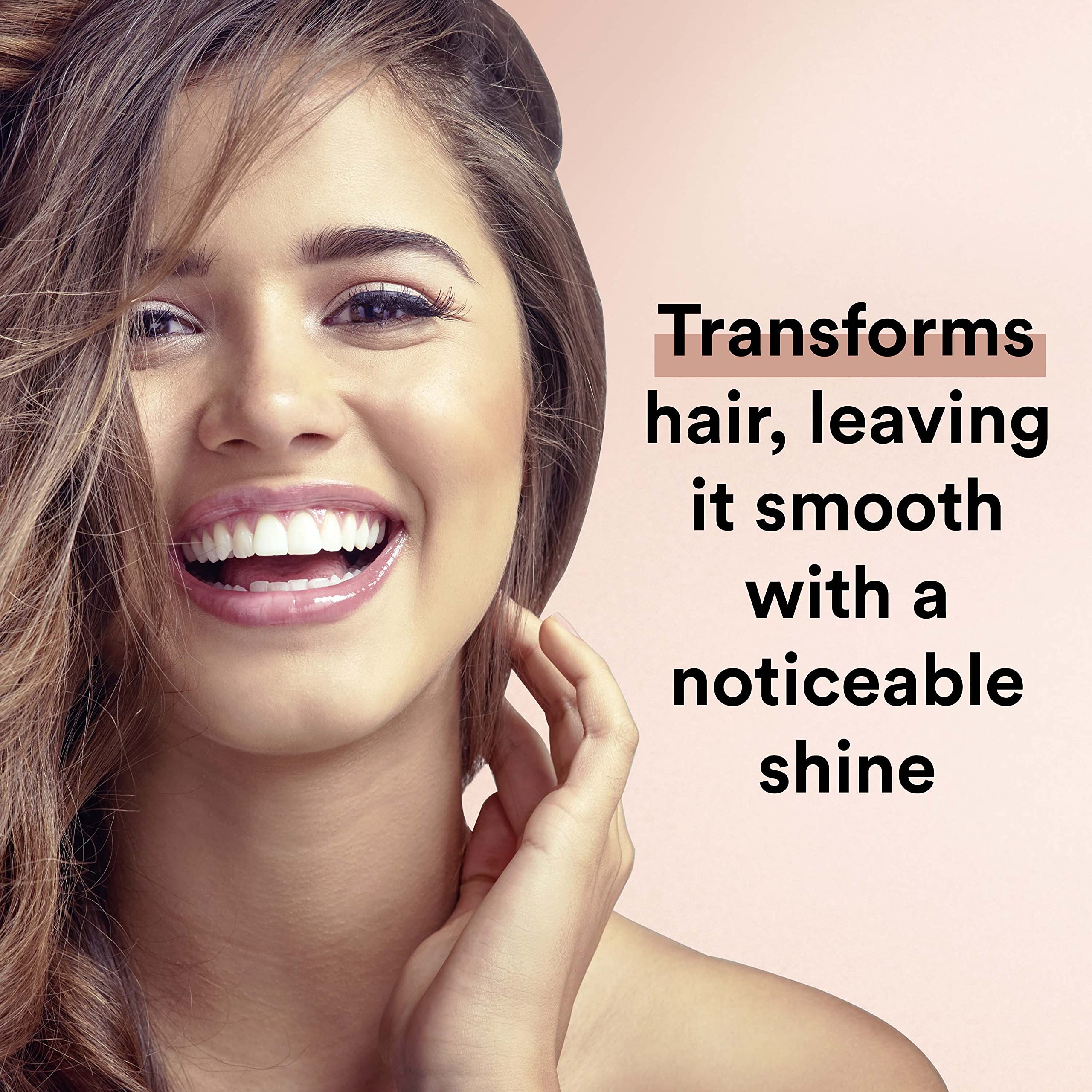 Suave Moroccan Infusion on wet hair for lasting shine.