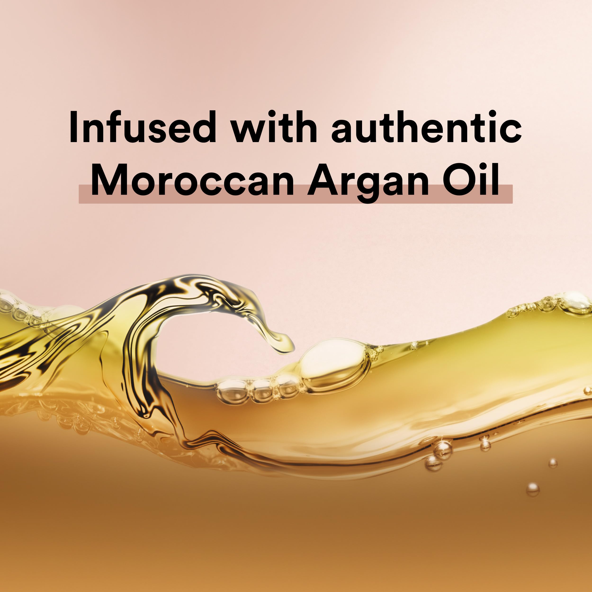 Suave Moroccan Oil Infusion bottle with glossy hair finish conveys salon-like shine possibilities.