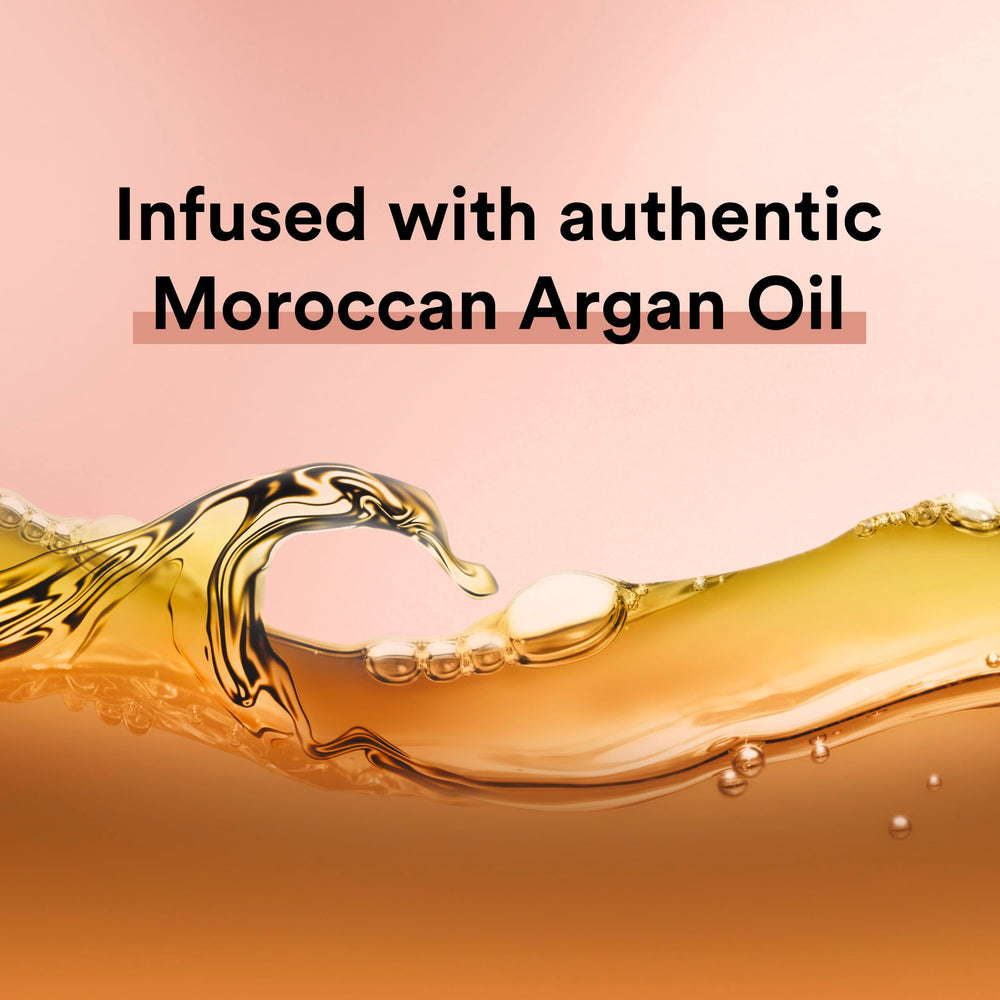 Suave Moroccan Oil Infusion bottle with glossy hair finish conveys salon-like shine possibilities.
